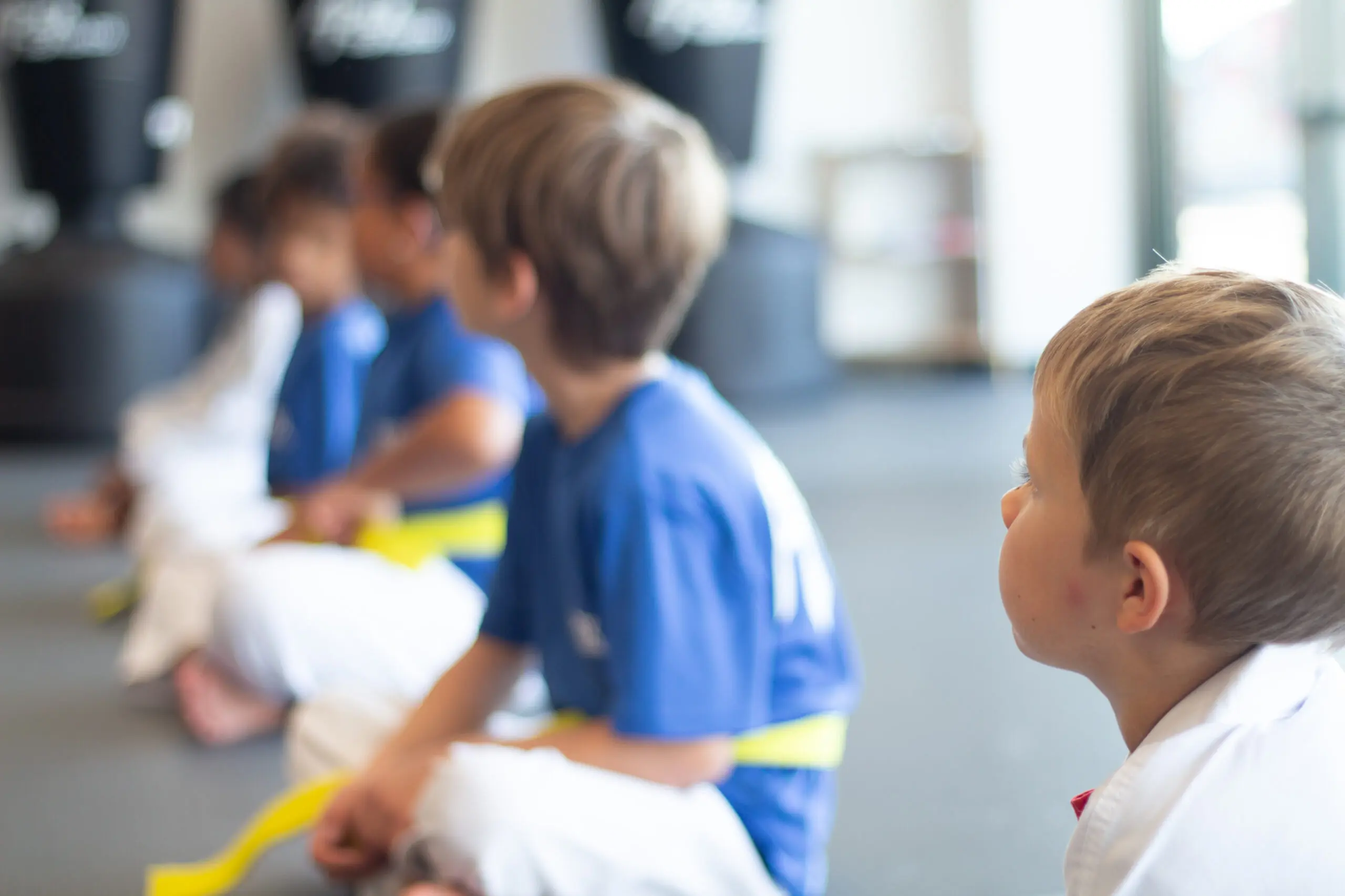 Most martial arts combine striking and grappling techniques with elements of spiritual development, offering a full-body workout that improves mental health, social skills, and emotional resilience, making martial arts a well-rounded activity for young children starting martial arts.