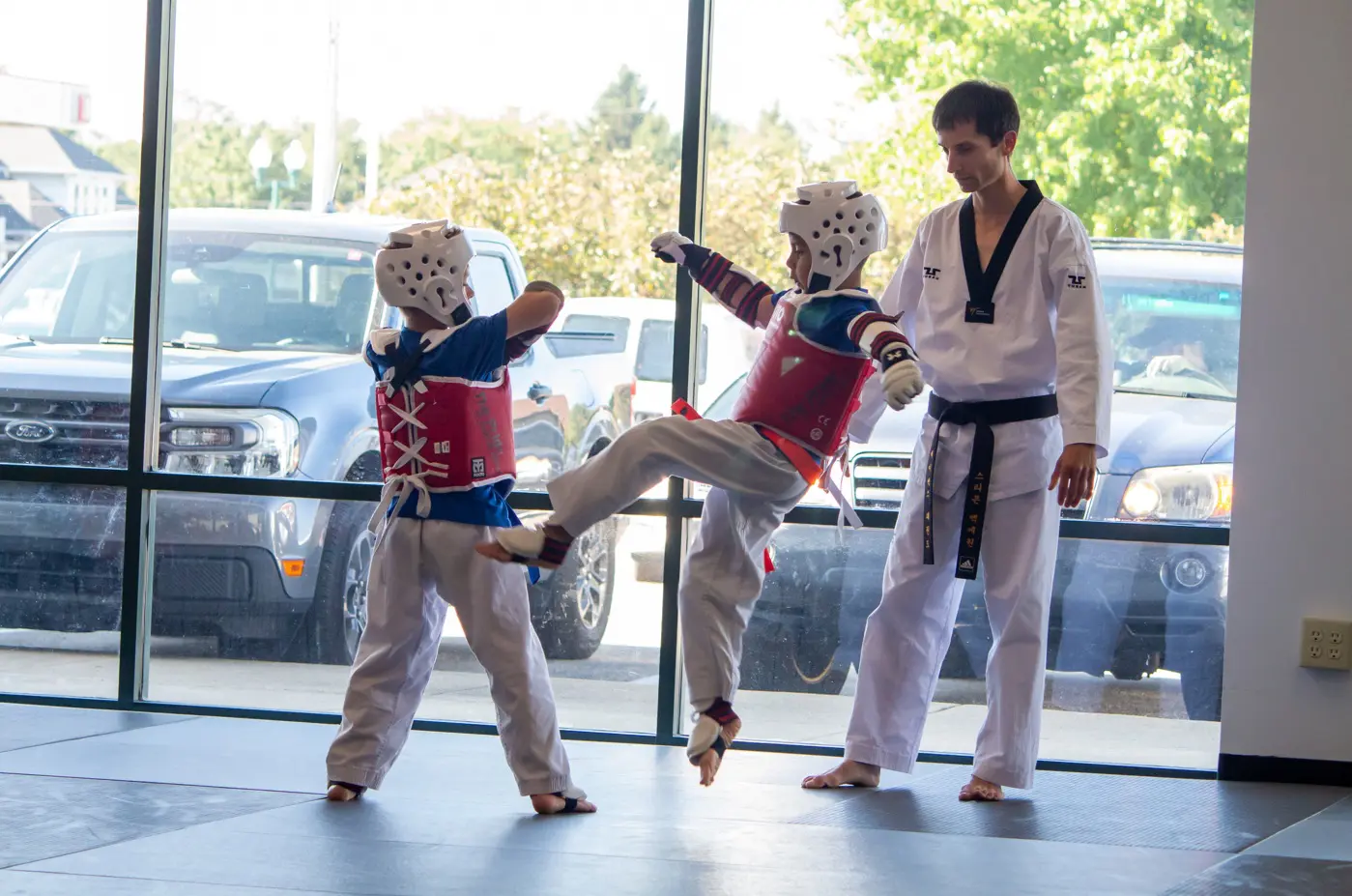 Kids martial arts programs like karate classes, kung fu, taekwondo, and Brazilian jiu-jitsu offer self-defense training, martial arts techniques, and grappling techniques to improve coordination, motor skills, and physical fitness in a fun environment.