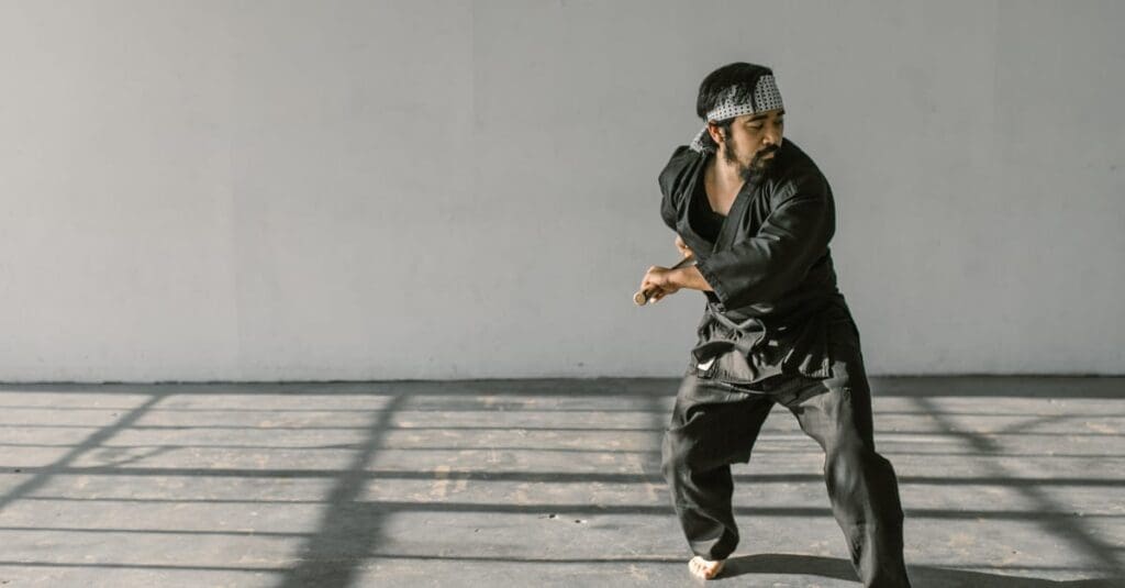 A practitioner showing a technique during martial arts for adults training